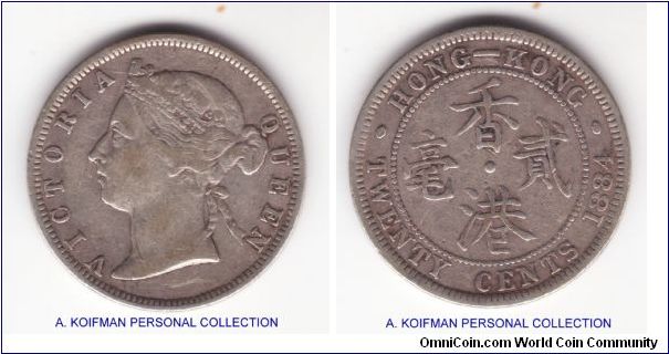 KM-7, 1884 Hong Kong 20 cents; silver, reeded edge; mintage of 80,000; coin is in fine plus condition.