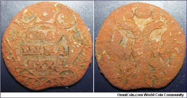 Russia 1735 polushka. With a nice cud. Corroded.