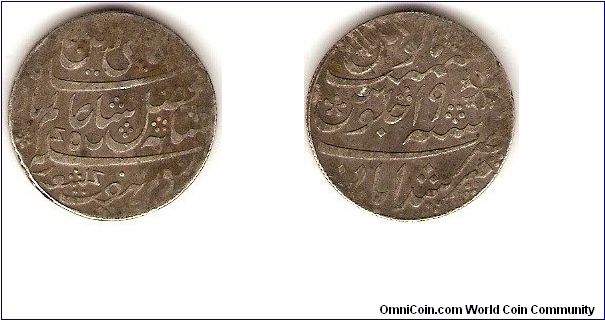 sulver rupee
struck for the city of Musrhidabad, in the name of Shah Alam II with frozen date (19th regnal year).
This coin shows upright milling, so it has been struck in the period 1819-1832