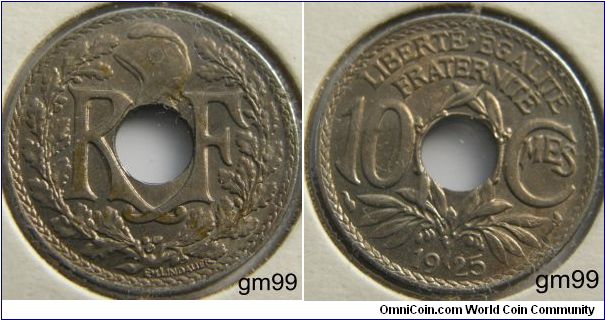 10 Centimes (Copper-Nickel) : 1917-1938
Obverse: Letters within wreath, either side of hole,
 R F
Reverse: Wreath below and between value,
 LIBERTE EGALITE FRATERNITE 10 CMES date