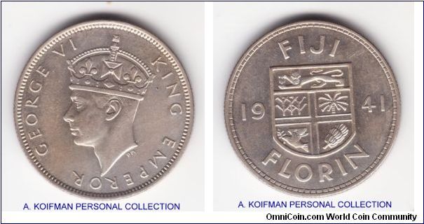 KM-13, Fiji 1941 florin; one of only 20,000 minted in XF or so condition; it actually has a some luster left unlike the scan; unusual pinprick holes on obverse, either a flan flaw or a later damage.