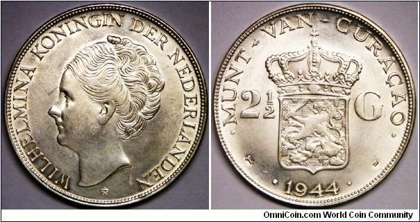 Wilhelmina of the Netherlands, 2 1/2 Gulden, 1944. 25.0000 g, 0.7200 Silver, .5787 Oz. ASW. Mintage: 200,000 units (note: 60,000 units melted down after minting). Lustrous AU.