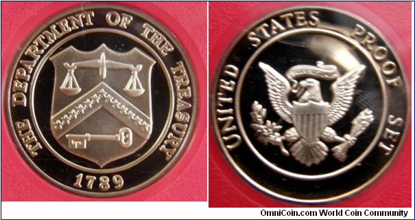 A U.S. Mint proof set coin occupies the space of a 6th coin.