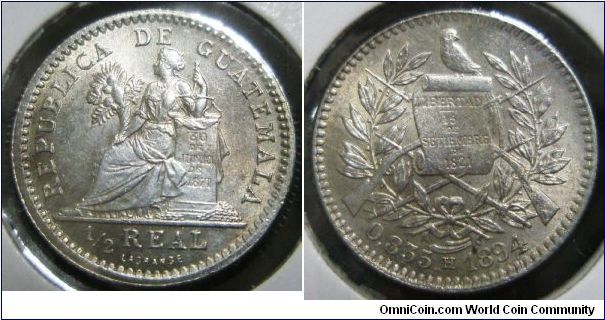 Republic De Guatemala, 1/2 Real (Medio), 1894H. 1.5000 g, 0.8350 Silver, .0402 Oz. ASW. Mintage: 900,000 units. UNC.