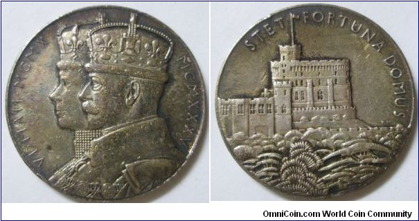 George V, Silver Jubilee 1935, Official Silver Medal, by Percy Metcalfe, conjoined crowned busts of King and Queen Mary left. Reverse: the Round Tower at Windsor Castle. With scuff marks. About extremely fine.