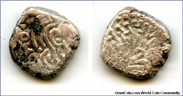 414 - 455 AD 
The Gupta Empire 
Local imitations of a silver drachm of King Kumaragupta I
Crude bust of king
Formalized Garuda standing facing with spread wings, degraded Brahmi inscriptions