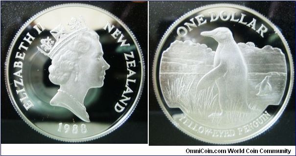 New Zealand, Queen Elizabeth II, One Dollar, 1988. 27.216 gms, diam. 38.735, 0.925 silver, grained edge. Obverse: Elizabeth II New Zealand 1988 around the periphery. Reverse: Yellow-eyed Penguin.