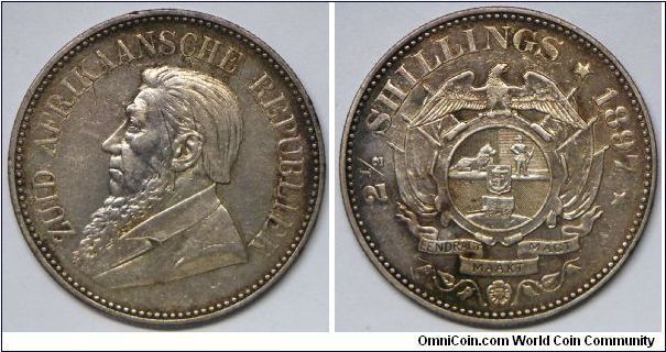 Republic, 1 1/2 Shillings, 1897. 14.06g, 0.9250 Silver, .4205 Oz. ASW. Mintage: 149,000 units. Scratches and polished but re-toned. aEF detail. [SOLD]