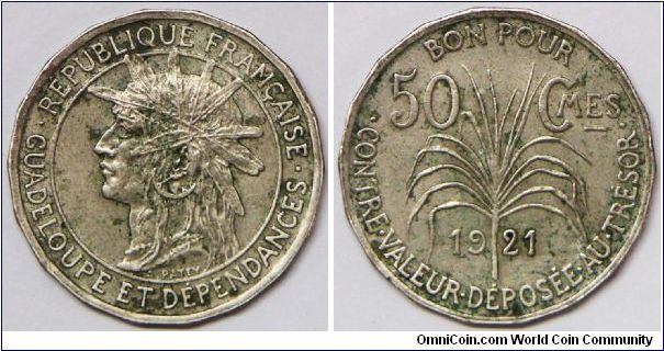 French Colony (1816 - to date) - Guadeloupe, 50 Centimes, 1921. Copper-Nickel. Obv: Armored head left within circle. Rev: Sugar cane stalk divides date and domination. Shape: 18-side. Mintage: 600,000 units. EF or better. Tough to locate this nice.