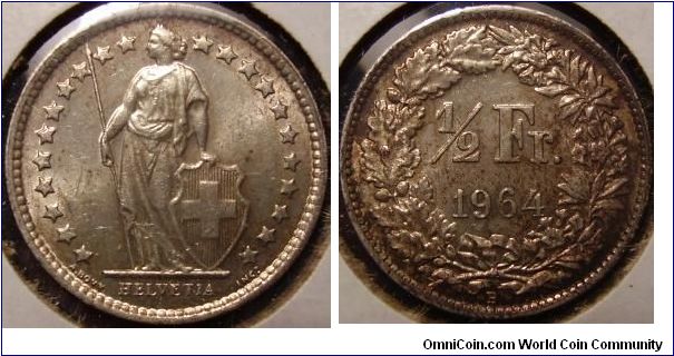 Nicely toned 1964 1/2 franc