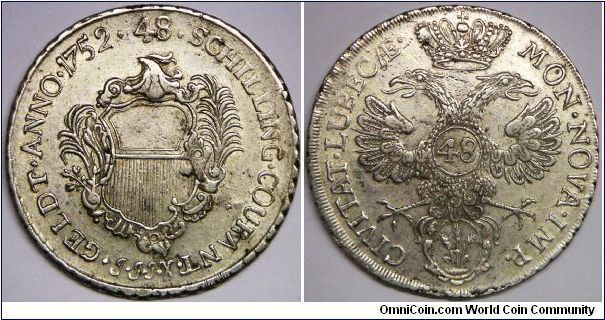 German States - Lubeck, Friedrich August, Thaler of 48 Schilling, 1752 JJJ (One Year Type). Obverse: City arms with ornate frame. 27.5100 g, 0.7500 Silver, .6633 Oz. ASW., 40mm. EF. (Note: 6 different obverse ornate frame exists with different market value)