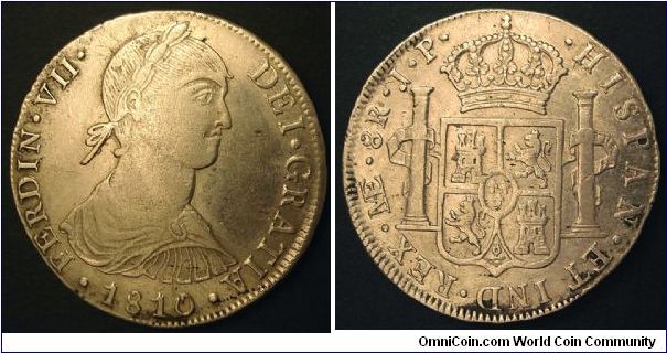 This was minted in Lima Peru in 1810 and is the second of the type deemed the Lima bust which started being minted after King Charles IV's death in 1808. This (1810) was the second year of King Ferdinand VII's rule and obverse dies with his visage had not yet arrived in Lima. Instead of using a posthumus design with King Charles IV's visage, such as was being done in Columbia and Guatemala, the head engraver made a obverse die of what he thought the king looked like. Obviously the description wa