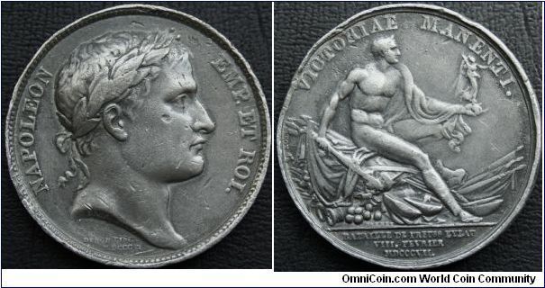 Obv: Napoleon EMP.ET.ROI. By DROZ. FECIT. DENON DIREX MDCCCVI.     	Rev: VICTORIAE MANENTI. BATAILLE DE PREUSS EYLAU VIII FEVRIER MDCCCVII. By BRENET.  40MM Tin or lead trial strike.  Note the obverse is dated 1806 whereas the reverse is dated 1807.  The battle was in effect a bloody draw, but the French were left in possession of the battlefield when the Russians withdrew overnight.