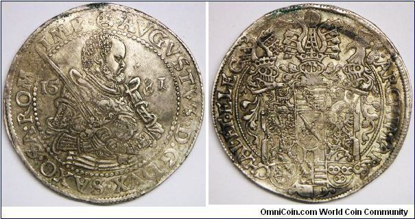 German States - Saxony, Albertine Line, August (1553-1586), Thaler, 1581. Obverse: Bust right with sword divide date. Reverse: Coat-of-arms surmounted by three helmets. 28.9100 g, Silver, 40mm. About EF to EF.