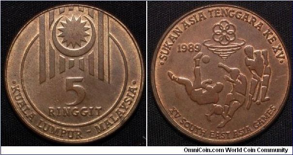 Copper Plated Zinc. Subject: 15th Southeast Asian Games. Obv: Star design within small circle above value. Rev: Soccer players below date and design. Mintage: 500,000.