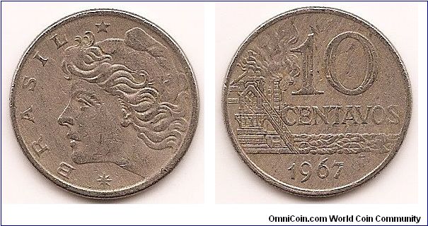 10 Centavos
KM#578.1
Copper-Nickel Obv: Liberty head left Rev: Oil refinery, denomination and date at right