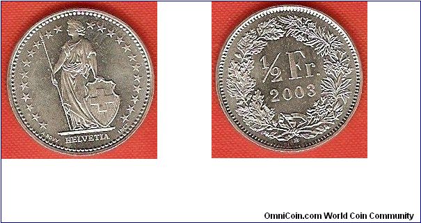 1/2 franc
medal alignment
23 stars around figure of Helvetia
copper-nickel