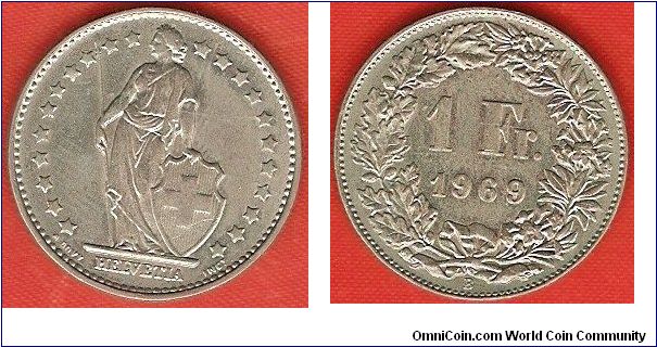 1 franc
coin alignment
22 stars around figure of Helvetia
copper-nickel