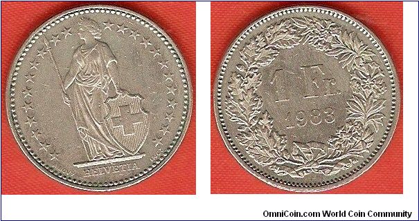 1 franc
medal alignment
23 stars around figure of Helvetia
copper-nickel