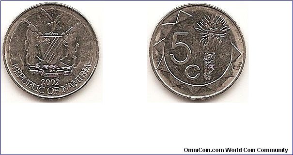 5 Cents
KM#1
2.2000 g., Nickel Plated Steel, 16.9 mm. Obv: Arms with supporters Rev: Value left, aloe plant within 3/4 sun design