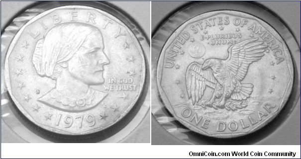 SUSAN B. ANTHONY
1979-S ONE DOLLAR-
 Mintmark: S (for San Francisco, CA) on the left side of the obverse, just above Anthony's shoulder. Metal Content:
Outer layers - 75% Copper, 25% Nickel
Center - 100% Copper