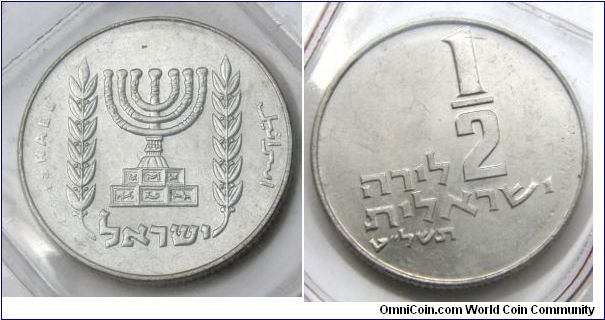 Half-Lira,Cupronickel. Reverse: Emblem of the state of Israel. Seven-branched candelabrum(menorah) of State Emblem, bas-relief of the Arch of Titus in Rome, depicting spoils from the Jerusalem Temple destroyed in 70 CE. 1979 Official Uncirculated Set'. coins w/o mint mark. The Jewish Year 5739 in Hebrew letters.