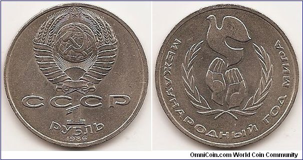 1 Rouble
Y#201.3
Copper-Nickel, 31 mm. Subject: International Year of Peace Obv: National arms divide CCCP with value below Rev: Hands within wreath releasing dove