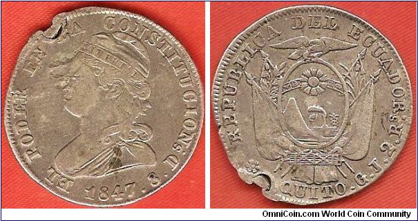 2 reales
0.800 silver (8 Ds)
Quito mint
GJ= initials of assayer Guillermo Jameson
damaged coin