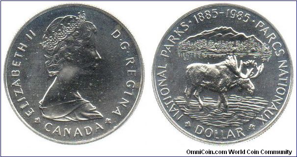 1985 silver 1 Dollar - This non-circulating dollar commemorates the 100th anniversary of the establishment of Canada's National Parks system.