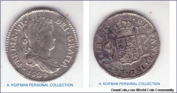KM-87, 1825 Bolivia real; Potosi mint; Ferdinand VII; looks about extra fine condition to me but blackened on reverse, possibly by the fire.