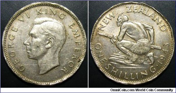 New Zealand 1943 1 shilling. Nice details but banged up edge.