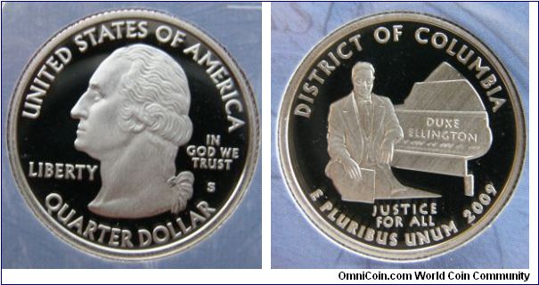 The District of Columbia quarter reverse features native son Duke Ellington, the internationally renowned composer and musician, seated at a grand piano with the inscriptions, DISTRICT OF COLUMBIA, DUKE ELLINGTON and JUSTICE FOR ALL, the District's motto.