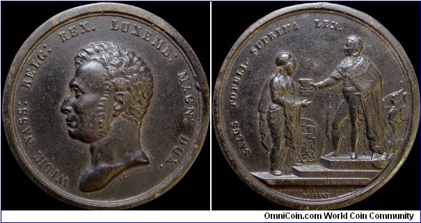 1815 Couronnement de Guillaume Ier, Netherlands.

An iron medal that may have been cast.                                                                                                                                                                                                                                                                                                                                                                                                                               