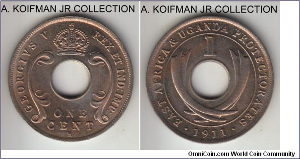 KM-7, 1911 British East Africa cent, heaton mint (H mint mark); copper-nickel, holed flan, plain edge; George V, common but nice bright uncirculated.