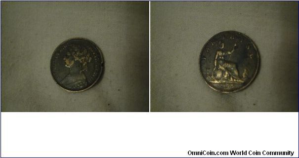 an 1875 h farthing, the F in F.D has the top cut by the line that boarders the legend