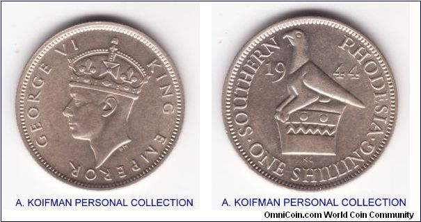 KM-18a, 1944 Southern Rhodesia shilling; reduced silver content in this series was the only change; nice good extra fine to about uncirculated condition with some bagmarks, a cun on King's nose appears to be a flad defect or a strikethrough rather then an aftermint impact; few bagmarks but overall very nice.