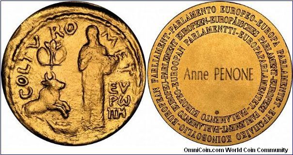 European Parliament Gold Medal. A reproduction of an ancient Greek third century coin from Tyre, featuring a standing figure of Europa, and the legend (inscription)
COLTURO MET (COLTVRO MET)
EU / RO / PA
There is a makers mark HF for Huguenin Freres of Le Locle Switzerland, the fitted box describes them as 'Medailleurs'. Reverse shows European Parliament inscribed in eleven languages in three concentric circles:
Th individual recipient's name is hand engraved horizontally in the centre.