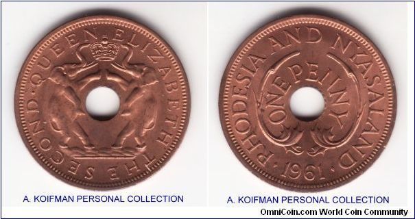 KM-2, 1961 Rhodesia & Nyasaland penny; almost completely red; bronze plain edge with dancing elephants :)
