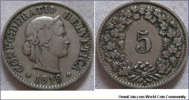 nice early swiss 5 centimes, the design on this ran from 1879 so its in a nice condition