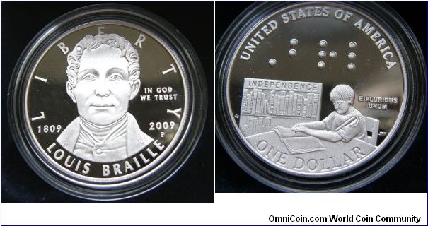 The 2009 Louis Braille Bicentennial Silver Dollar commemorates the 200th anniversary of the birth of Louis Braille, inventor of the Braille system, which is still used by the blind to read and write. 
PLEASE READ MORE:
http://www.usmint.gov/mint_programs/commemoratives/index.cfm?action=2009LouisBraille