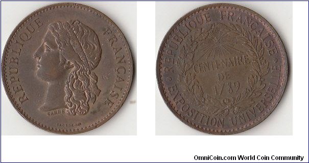 CENTENAIRE DE 1789
EXPOSITION UNIVERSELLE

Can someone help identifying this Medal or (coin) ???