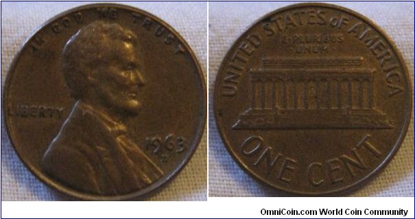 spread under the B and a small one under the L in liberty, a nice 1963 D cent in a decent condition