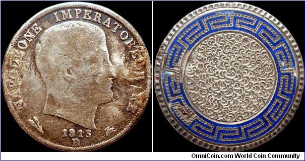 1813 Love Token?

Someone with time on their hands defaced a perfectly good 1813 2 Lire from the Napoleonic Kingdom of Italy.                                                                                                                                                                                                                                                                                                                                                                                          