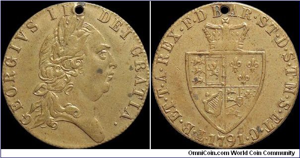 George III, Guinea token, Great Britain.

Very common and could have been produced anytime in the past 200 years.                                                                                                                                                                                                                                                                                                                                                                                                 