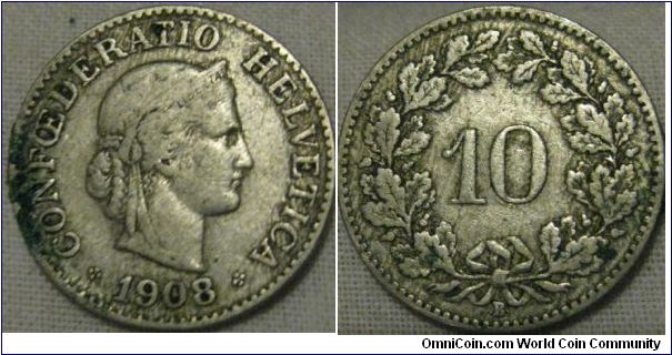 1908 10 centimes from switzerland, fine condition, still a good coin considering the lifespan of this design.