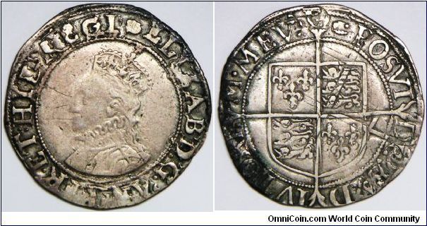 Elizabeth I (1558-1603), Shilling, n.d (1594-1596), 5th issue. Obv. Legend: ELIZAB DG ANG FR ET HIB REGI (Elizabeth by the grace of God Queen of England France and Ireland). Rev. Legend: POSUI DEU ADIVTOREM MEU (I have made God my helper). This specimen is double struck especially on reverse. Most milled shillings appear to have been weakly struck, particularly obverse portrait. Specimens with VF to EF condition are quite rare and desirable. For detail, see my blog article 52.