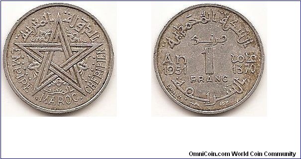 1 Franc -AH1370 -
Y#46
Aluminum, 19.5 mm. Obv: Legend around star Rev: Value flanked by dates