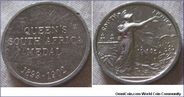 small copy of the queens south africa medal, probably from a set showing the designs of medals
