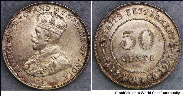 British Straits Settlements George V 50 Cents. Toned choice uncirculated.