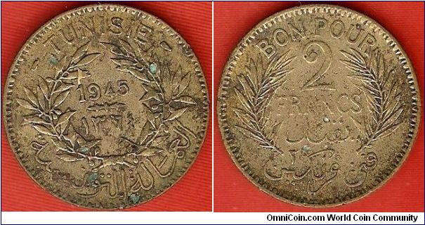 French Protectorate
2 francs
AH1364
aluminum-bronze
quite a dirty coin, but in good condition